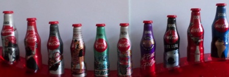 M06000-35 € 25,00 coca cola complete set 10 mini alu flesjes